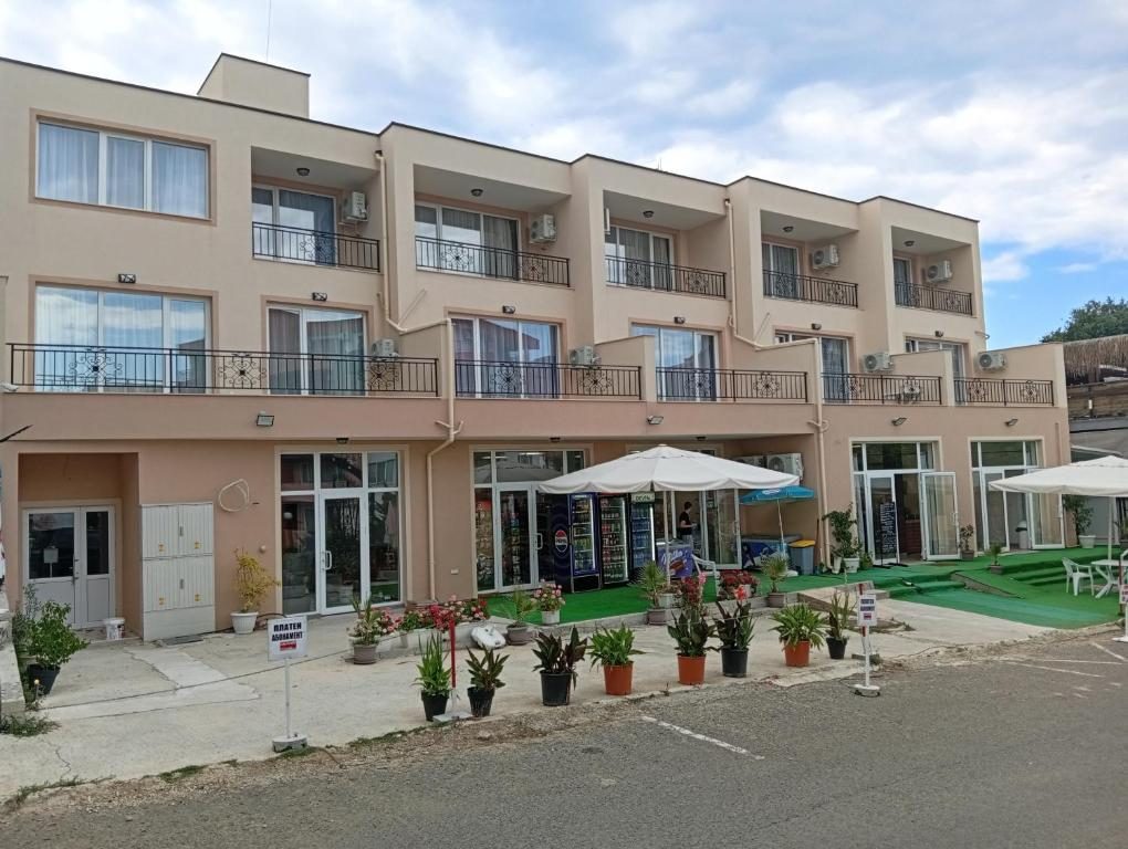 Kristan Apartments building with free parking in front